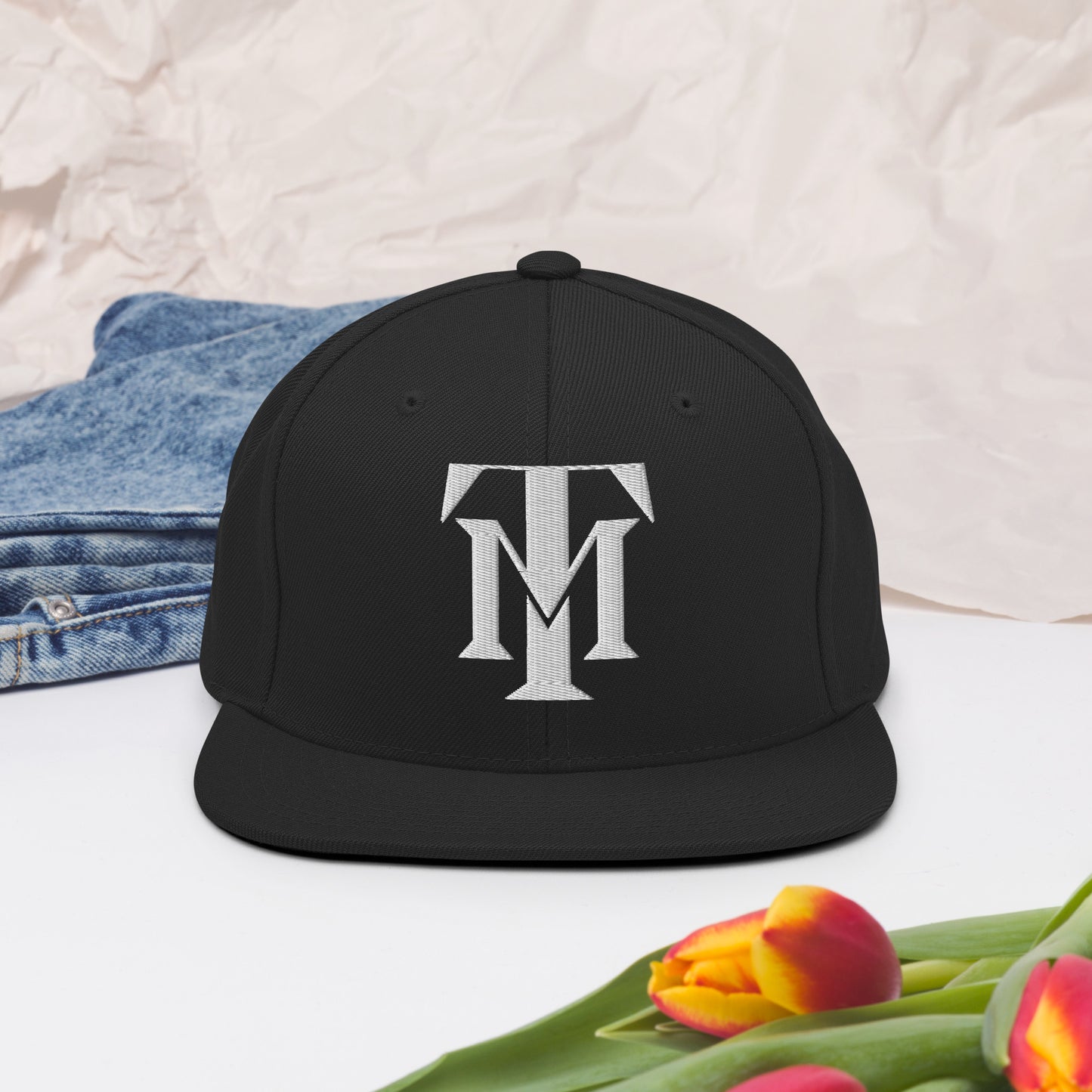 tm snapback hat